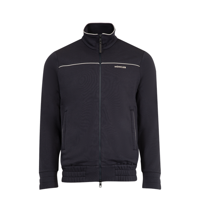 Image 1 of 3 - NAVY - MONCLER Fleece Zip Jacket featuring contrast piping, comfortable fleece, stand collar, two-way zipper, logo text front, welt pockets and banded cuffs and hem. 44% cotton, 44% modal, 12% polyester.