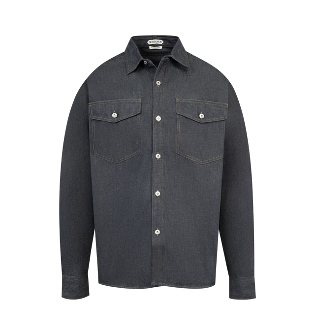 Image 1 of 3 - BLUE - JW ANDERSON Oversized Shirt featuring relaxed proportions, logo embossed leather patch, button front closure, button cuffs and button flap chest pockets. 100% cotton. Made in Japan.