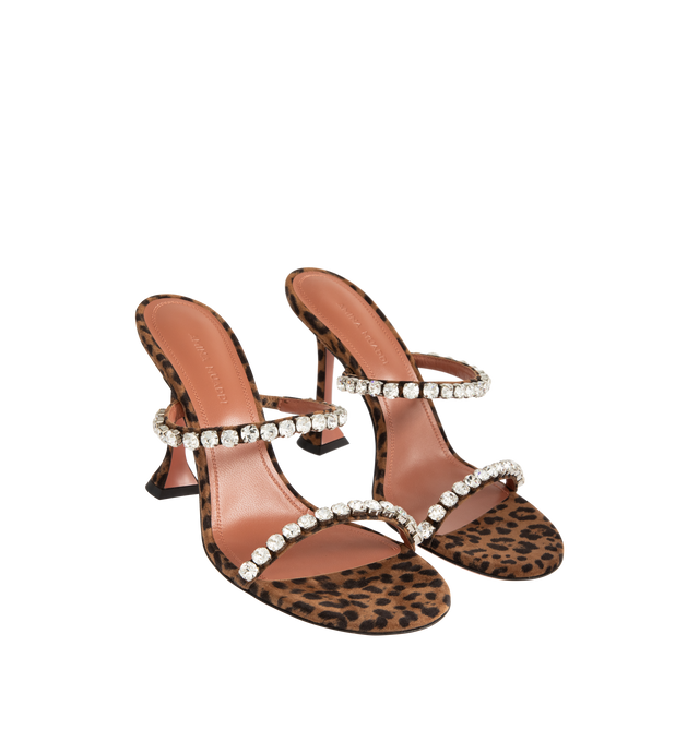 Image 2 of 4 - BROWN - AMINA MUADDI Gigi Slipper 95 Leopard Printed featuring 95mm mini CL heel, crystal strap and rounded toe. Upper: 100% calf leather. Lining: 100% goatskin. Sole: 90% calf leather, 10% TPU. Made in Italy.