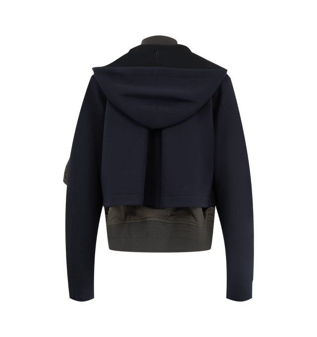 Image 2 of 4 - NAVY - Sacai sponge sweat hoodie with signature layered construction, double collar, zip-front closure, drawstring hood and rib-knit stand collar. Outer material is 62% cotton / 38% polyester with 100% nylon twill panels and 100% polyester lining and filling.
