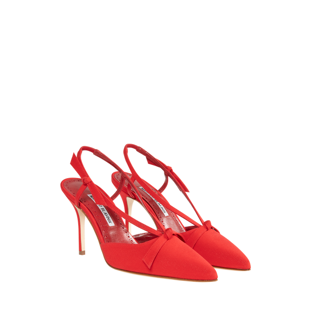 Image 2 of 4 - RED - MANOLO BLAHNIK CORNITA CREPE DE CHINE pointed toe mules featuring bow detailing and slingback design. Finished with 90mm stiletto high heel. Upper: 100% silk. Sole: 100% calf leather. Lining: 100% kid leather. Italian sizing. Made in Italy. 
