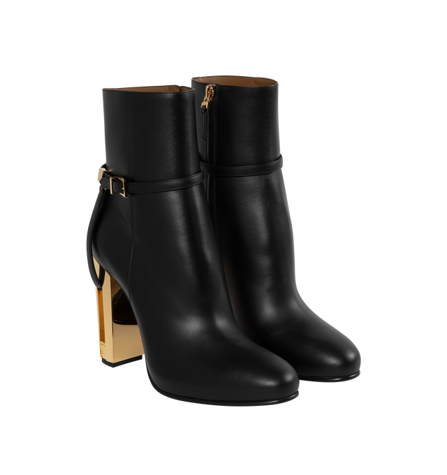 Image 2 of 4 - BLACK - FENDI Delfina Ankle Boots featuring round-toe, side zipper closure on the inside, heel with cut-out detail and gold-colored metal FF motif. 105MM. 100% calfskin. 
