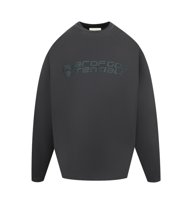 Image 1 of 3 - BLACK - FEAR OF GOD ESSENTIALS 90s Long Sleeve Tee featuring an oversized 90s-inspired silhouette, exaggerated proportions with dropped shoulders for a relaxed drape that tapers to rib-knit cuffs, HD print application of the Fear of God Essentials on front, the Essentials logos on the sleeves and signature rubberized Fear of God Essentials label at the collar. 100% cotton jersey.