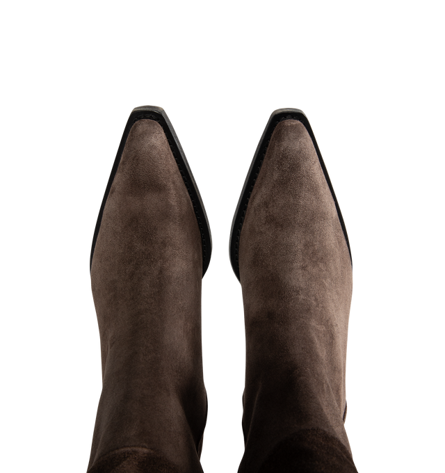 Image 4 of 4 - BROWN - Khaite Clive boot inspired by well-worn Western classics. Featuring stitched welt, 1" stacked leather heel, snip-toe silhouette with deliberately tilted shaft in hand-worked, vegetable-tanned calfskin brushed to a rich patina. Vintage vacchetta (100% calf leather). Made in Italy.