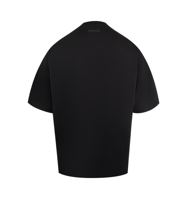 Image 2 of 2 - BLACK - FEAR OF GOD ESSENTIALS 90's Tee made from medium-weight 100% cotton jersey. The crewneck tee features a 90s fit with oversized proportions and dropped shoulders. Branding includes a "Fear of God State" screen-printed logo on the front and a Fear of God Essentials rubberized label at the back collar. 100% cotton.