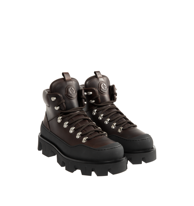 Image 2 of 4 - BROWN - MONCLER Peak Trek Leather Ankle Boots featuring leather upper, leather insole, lace-up closure and rubberized TPU sole with EVA filler. Calf length 13cm. Sole height 5cm.