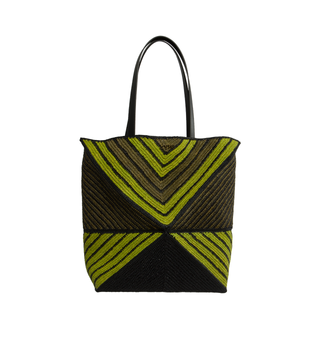 Image 1 of 4 - GREEN - LOEWE PAULA'S IBIZA Puzzle Fold Tote x- Large takes the iconic bags signature geometric lines and reimagines them in graphic and architectural panels that allow the bag to fold completely flat, making it the perfect travel companion. Soft, lightweight and inventively crafted, it features mixed stripes, calfskin handles and is finished with gold metal LOEWE branding. This XL version is made in Spain using raffia palm that is cultivated, harvested, sun-dried and woven in Madagascar by l 