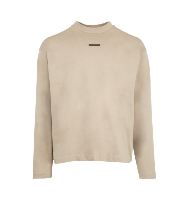 Image 1 of 2 - BROWN - FEAR OF GOD Classic Fit T-Shirt featuring front and back logo details, crew neck and long sleeves. 100% cotton.