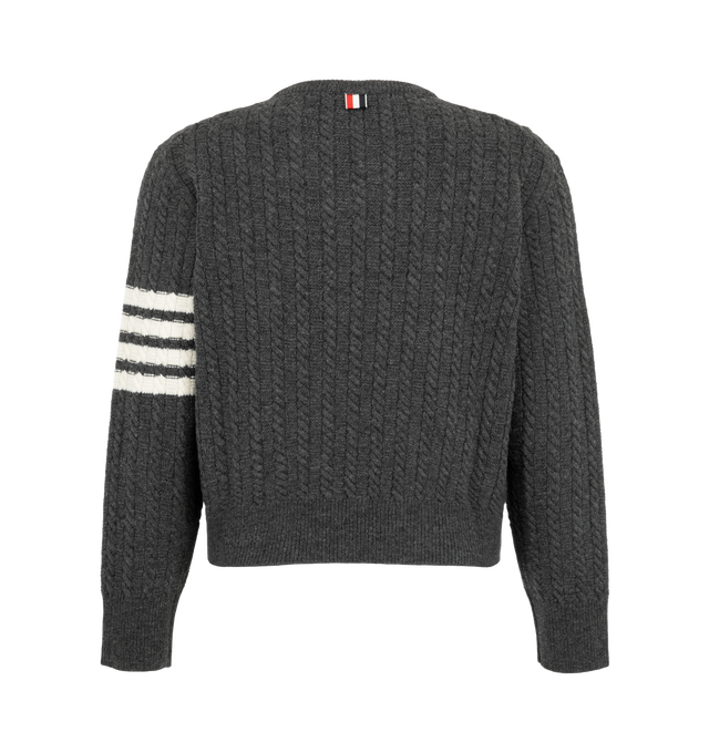 Image 2 of 2 - GREY - Thom Browne Men's Intarsia Anchor and Cable Relaxed V-Neck Pullover is crafted from virgin merino wool with cable-knit construction and jersey float jacquard for added texture. A contrast-stitched anchor intarsia, signature 4-Bar detailing, ribbed neckline, cuffs, and hem, and a striped grosgrain loop tab complete the design. Main Material: 100% Virgin Wool. Made in Italy.