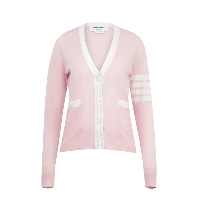 Image 1 of 2 - PINK - THOM BROWNE WOol 4 Bar V Neck Cardigan featuring fine Merino wool with 4-bar stripe detail at left sleeve, button front closure, two front pockets, buttoned side vents with signature striped grosgrain trim and signature striped grosgrain loop tab at back of neck. 100% virgin wool. Made in Italy.