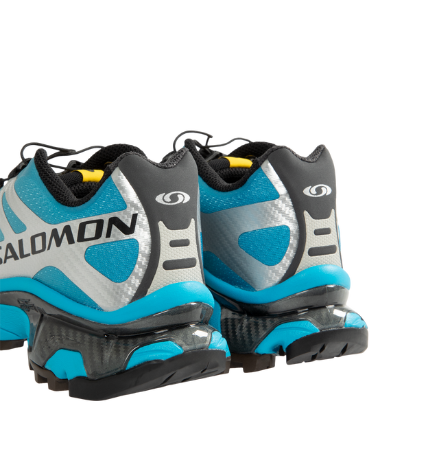 Image 3 of 5 - BLUE - Salomon Men's XT-4 OG Sneakers are crafted with a lightweight textile and synthetic upper and feature the brand's Agile Chassis System, Quicklace technology, and dual-density EVA cushioning for exceptional stability and comfort. Reviving one of Salomon's iconic trail-running silhouettes, these designer sneakers combine technical performance with archival outdoor style, delivering superior support, durability, and all-terrain traction for both city streets and rugged trails. Main Materi