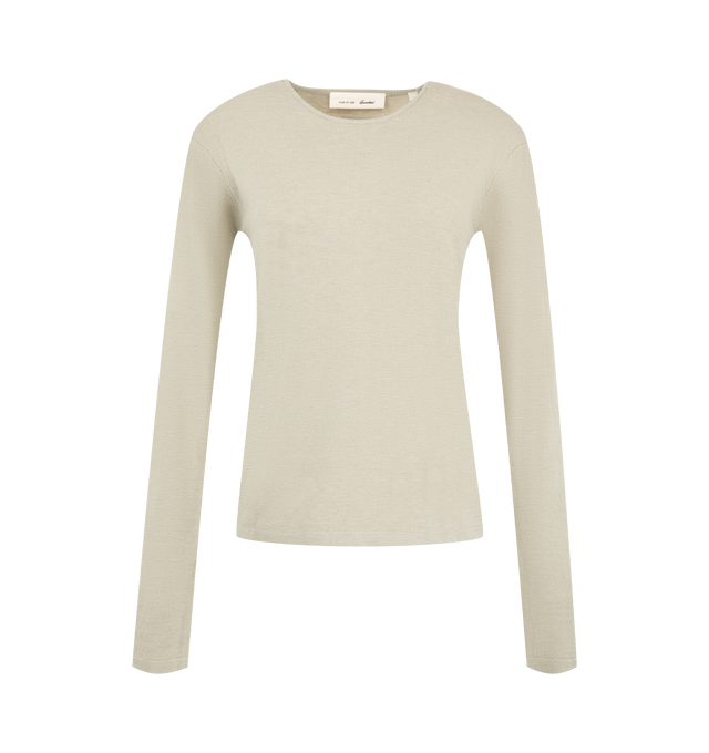 Image 1 of 2 - NEUTRAL - Fear of God Essentials Womens Slim Long Sleeve Top is crafted from a soft knit. Features a classic slim contoured fit, ribbed crew neckline, long sleeves, and an Essentials signature label at the back collar. Main Material: 88% Polyester, 12% Nylon.
