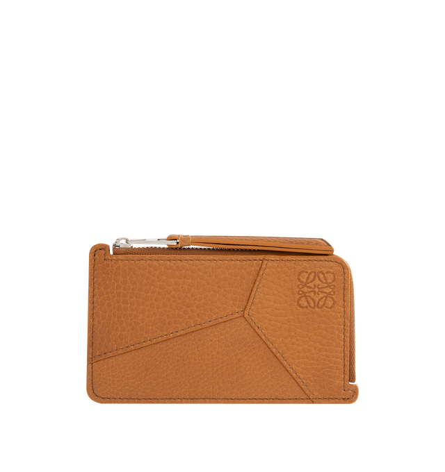 Image 1 of 3 - BROWN - LOEWE Puzzle coin cardholder in supple grained calfskin featuring geometric pattern, four card slots, one zipped coin compartment with calfskin pull, calfskin lining and embossed Anagram. Supple Grained Calf. 7.5 cm x 13 cm x 1 cm. Made in Spain.