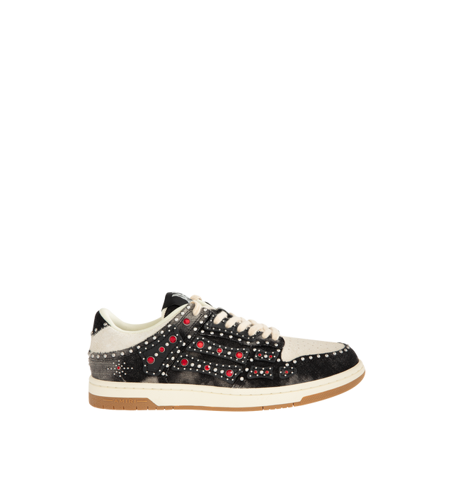 Image 1 of 5 - BLACK - AMIRI Stud Skel Top Low Sneaker featuring bone appliques, stud detailing, two-tone rubber sole with an upper paneled with washed denim and textured suede. 95% cotton, 5% polyester. Sole: rubber.