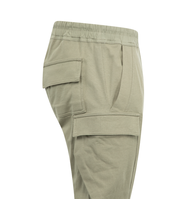 Image 3 of 3 - GREEN - RICK OWENS Men's Mastodon Megacargo Tapered Cotton-Jersey Drawstring Trousers in a comfortable heavyweight cotton-jersey. Pull-on style featuring signature elongated drawstrings, cargo pockets on each leg, ribbed trim at ankles. 100% cotton.