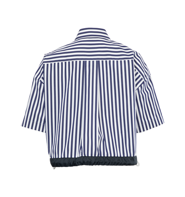 Image 2 of 3 - NAVY - SACAI Thomas Mason Cotton Poplin Shirt featuring button down shirt, boxy silhouette, patch pockets, spread collar and drawstring hemline. 100% cotton. 
