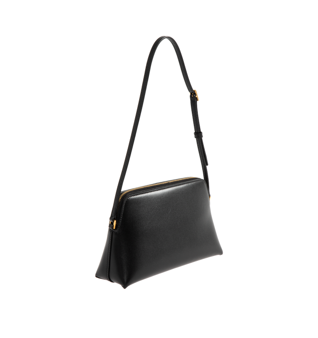 Image 2 of 3 - BLACK - SAINT LAURENT Mini Bag featuring slightly shiny calfskin, embossed with the SAINT LAURENT PARIS signature, adjustable strap for bespoke shoulder carry, leather lining, bronze-toned hardware, zip closure, three main compartments and one card slot. 8.3" x 4.3" x 2.6". Strap drop: 7.9". Calfskin. Made in Italy.