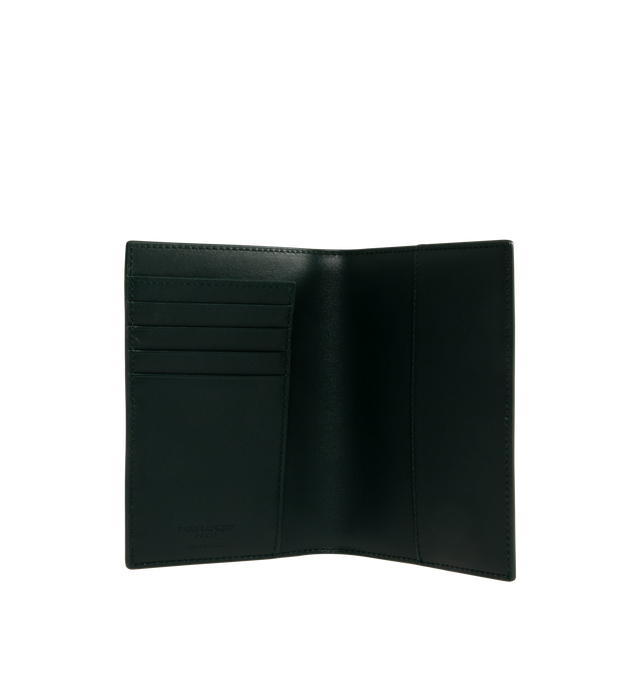 Image 3 of 3 - BLACK - SAINT LAURENT Passport Holder featuring two passport inserts, four card slots, leather lining and logo on front. 3.9 x 5.5 x 0.6 inches. Calfskin. Made in Italy.