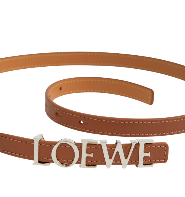 Image 2 of 2 - BROWN - LOEWE Loewe Bold Belt featuring logo lettering, pre-drilled holes, adjustable fit, gold-tone hardware and buckle fastening. 100% leather. Made in Spain.