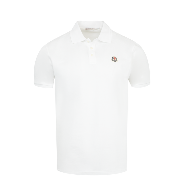 Image 1 of 2 - WHITE - MONCLER Polo Shirt featuring cotton piquet, collar, mother-of-pearl buttons, short sleeves and logo patch. 100% cotton.