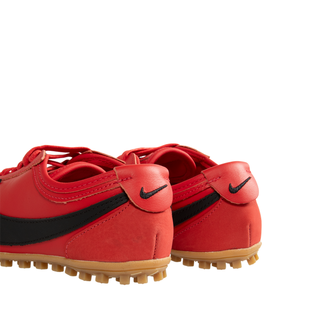 Image 3 of 5 - RED - Nike Women's Moon Shoe Sneakers are designed with a premium full-grain leather upper and the brand's iconic Waffle outsole, this heritage-inspired style captures the look and feel of a classic 1970s runner while delivering everyday comfort and durability. Main Material: Full-Grain Leather Upper. Outsole: Rubber Waffle Sole.