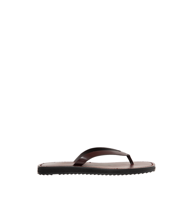 Image 1 of 5 - BROWN - The Row Refined flip flop sandal in shiny calfskin leather with stitched leather detailing and lightly treaded sole. 100% Calfskin Leather. Made in Italy.