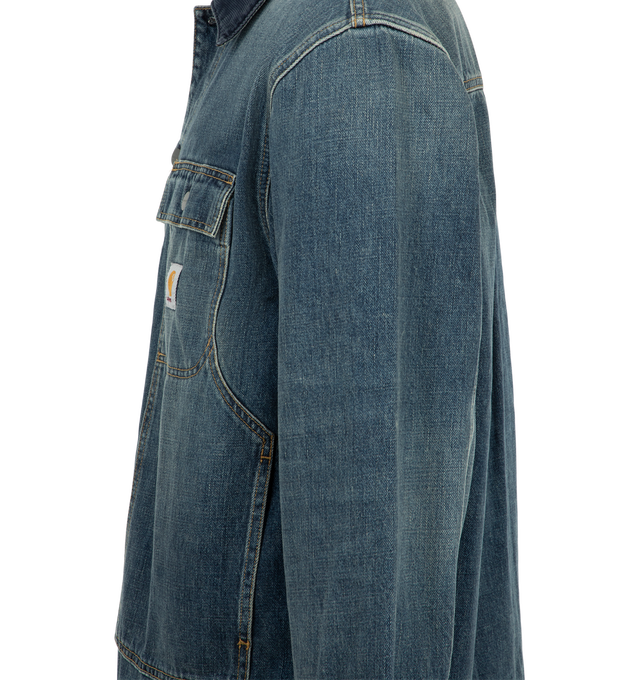 Image 3 of 3 - BLUE - Carhartt WIP Men's Oakland Shirt Jacket is crafted from heavyweight Camano denim and features an unlined construction, a corduroy collar, and a button-front closure with branded buttons. Inspired by the utility details of the brands Double Knee Pant, it is designed with two button-flap chest pockets, kangaroo pockets, bartack reinforcements at key stress points, and a woven Square Label. Main Material: 100% Cotton Camano Denim.