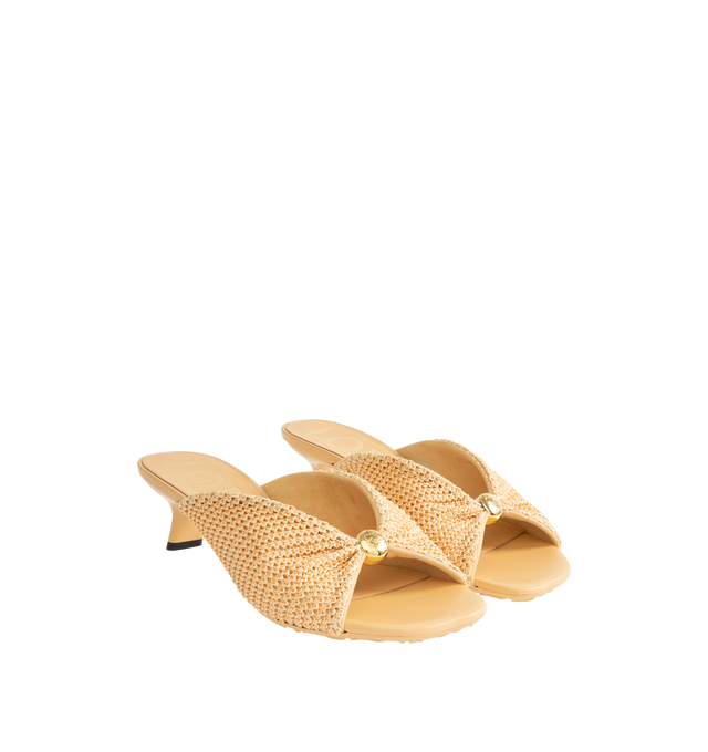 Image 3 of 5 - NEUTRAL - LOEWE PAULA'S IBIZA Pebble Soft slide in raffia-effect fabric featuring a raffia-effect upper, a metallic pebble with an Anagram engraved detail, petal toe shape, 45mm heel, engraved Anagram on pebble, padded leather insole and anagram embossed rubber outsole. Polyester effect raffia. Made in Italy.