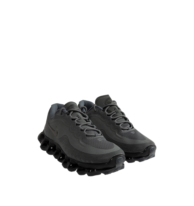 Image 2 of 5 - GREY - Nike Air Liquid Max Sneakers feature a textured upper with a low-cut silhouette for modern style and lasting comfort. These performance-inspired lifestyle sneakers combine a drop-in Cushlon midsole with a full-length point-loaded Max Air cushioning system for exceptional responsiveness, lightweight support, and all-day comfort. Main Material: Textile and Synthetic. Midsole: Cushlon with Max Air Cushioning. Sole: Rubber.