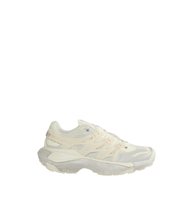 Image 1 of 5 - WHITE - SALOMON XT PU.RE Advanced Sneakers featuring bonded trim throughout, Quicklace closure, padded tongue and collar and mesh lining. Upper: textile. Sole: rubber. Made in Viet Nam. 