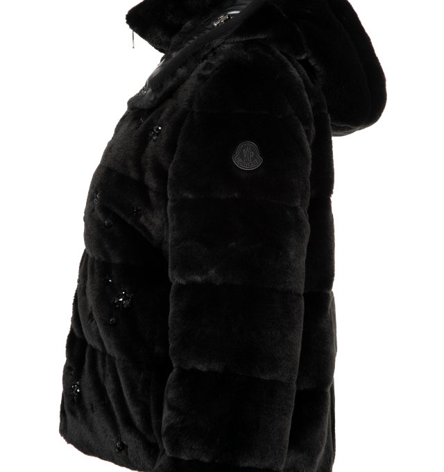 Image 4 of 4 - BLACK - MONCLER Andronne Sequin-Embroidered Hooded Short Down Jacket featuring faux fur, nylon laqu lining, down-filled, detachable hood, zipper closure, zipped pockets, elastic cuffs and hem and logo patch. 100% polyester. Lining: 100% polyamide/nylon. Padding: 90% down, 10% feather. Made in Italy.