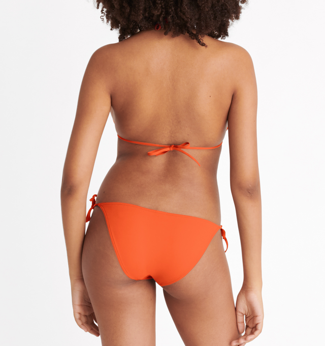 Image 7 of 8 - ORANGE - ERES Mouna Sliding Triangle Bikini Top featuring spaghetti straps. 84% Polyamid, 16% Spandex. Made in France. 