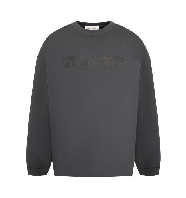Image 1 of 2 - GREY - FEAR OF GOD ESSENTIALS 90s Long Sleeve Tee featuring an oversized 90s-inspired silhouette, exaggerated proportions with dropped shoulders for a relaxed drape that tapers to rib-knit cuffs, HD print application of the Fear of God Essentials on front, Essentials logos on the sleeves and signature rubberized Fear of God Essentials label at the collar. 100% cotton jersey.