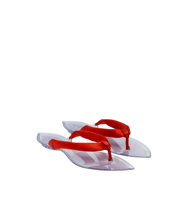 Image 1 of 1 - ORANGE - Azzedine Alaia Invisible Padded Thong Sandals are crafted with smooth satin uppers, pointed open toe silhouettes, and sculptural transparent soles.Upper: Satin textile; Lining: Rubber; Sole: Rubber insole and sole. Includes: dust bag, shoe box. Fit: True to size; european sizes. Made in Italy
