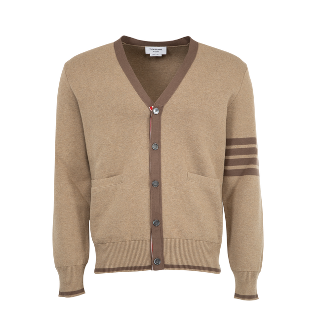 Image 1 of 2 - BROWN - THOM BROWNE Milano Stitch 4 Bar Cardigan featuring signature 4-bar detailing on the left sleeve, striped grosgrain trim at the front, cuffs, and side vents, front button closure, 2 front slip pockets, 4-bar detailing, buttoned cuffs with signature striped grosgrain trim, buttoned side vents with signature striped grosgrain trim and signature striped grosgrain loop tab. 100% cotton. Made in Italy.