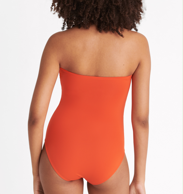 Image 5 of 6 - ORANGE - ERES Cassiope One-Piece Bustier Swimsuit featuring bust shirring at front and sides, U-shaped metal link between cups and gripper tape. Main: 84% Polyamid, 16% Spandex. Second: 68% Polyamid, 32% Spandex. Made in Italy. 