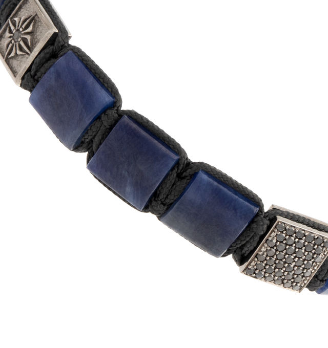Image 2 of 2 - BLUE - Shamballa Jewels 10mm Lock Bracelet combines the bold allure of blue sapphires with matte black ceramic beads, set against the backdrop of luxurious 18K Black Rhodinated Gold. The 10mm size ensures a commanding presence, making it an ideal choice for those who seek statement jewelry with a touch of elegance and exclusivity. Size XL measures 6.9 inches. Hirshleifers offers a range of pieces from this collection in-store. For personal consultation and detailed information about jewelry,