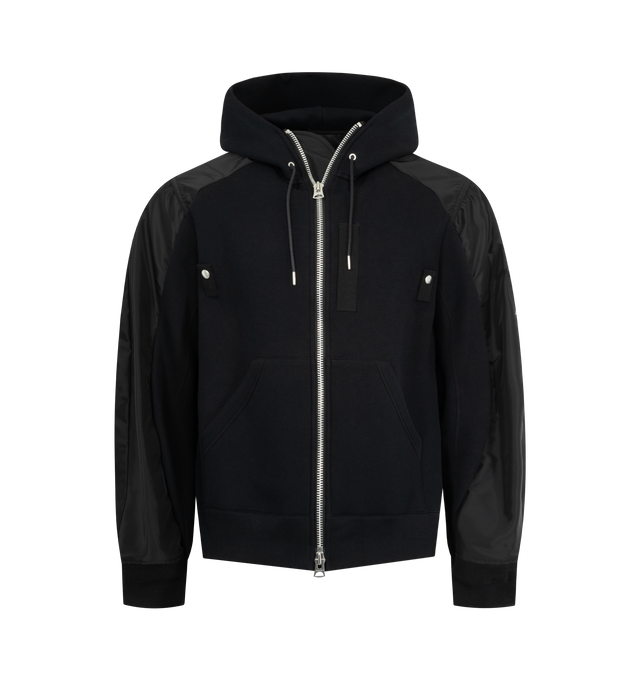 Image 1 of 3 - BLACK - SACAI Sponge Sweat Hoodie featuring paneled construction, drawstring at hood, two-way zip closure, twin grosgrain press-stud tabs at chest, front patch pockets, rib-knit hem and cuffs and logo-engraved silver-tone hardware.