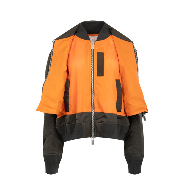 Image 4 of 4 - BROWN - Sacai Nylon Twill Blouson is crafted from nylon twill with lightweight padding. Features a blouson silhouette, mixed-media paneling, full lining, and modern utility-inspired construction. Outer: 100% Nylon; Parts: 55% Polyester, 44% Cotton, 1% Polyurethane; Lining: 100% Polyester; Filling: 100% Polyester. Made in Japan.