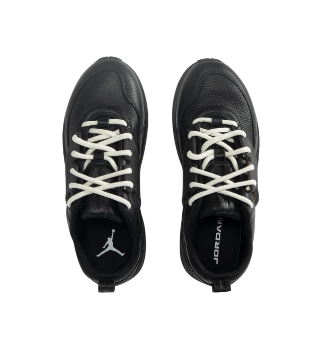 Image 5 of 5 - BLACK - Men's Jordan Trunner O/S SP Sneakers feature a leather upper with synthetic overlays, molded midfoot support wings, and signature Jordan branding for a modern athletic look. These lifestyle sneakers combine responsive Cushlon 3.0 foam cushioning, a lightweight foam midsole, and a durable rubber outsole for exceptional comfort, stability, and everyday traction. Main Material: Leather and Synthetic. Midsole: Foam with Cushlon 3.0 Cushioning. Sole: Rubber.