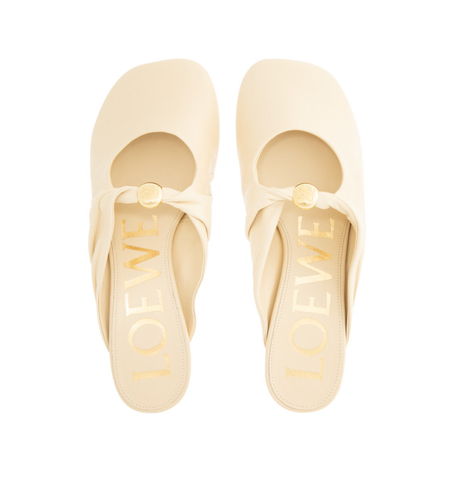 Image 4 of 4 - NEUTRAL - Loewe Women's Pebble Soft Mule in supple nappa lambskin with a flexible upper engineered for extra comfort, featuring a metallic pebble with an Anagram engraved detail, a signature petal toe shape, 45mm heel, engraved Anagram on Pebble, padded leather insole and Anagram embossed rubber outsole. Heel height: 4.5 cm. Nappa lambskin. Made in Italy.
