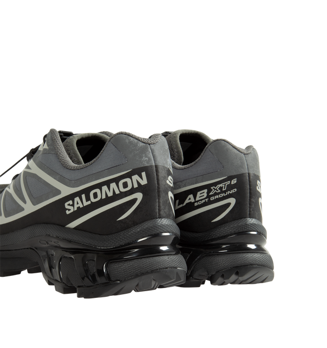 Image 3 of 5 - GREY - Salomon XT-6 Protective Sneakers are crafted from ripstop textile with textured TPU film overlays and feature the brand's iconic XT-6 silhouette reimagined through a durable workwear-inspired lens. Designed with Salomon's signature SensiFit construction, soft cushioning, and downhill stability technology, this technical style balances rugged functionality with everyday versatility. Main Material: Synthetic and Textile Upper. Lining: Textile. Insole: Textile. Outsole: Rubber. Closure: Q
