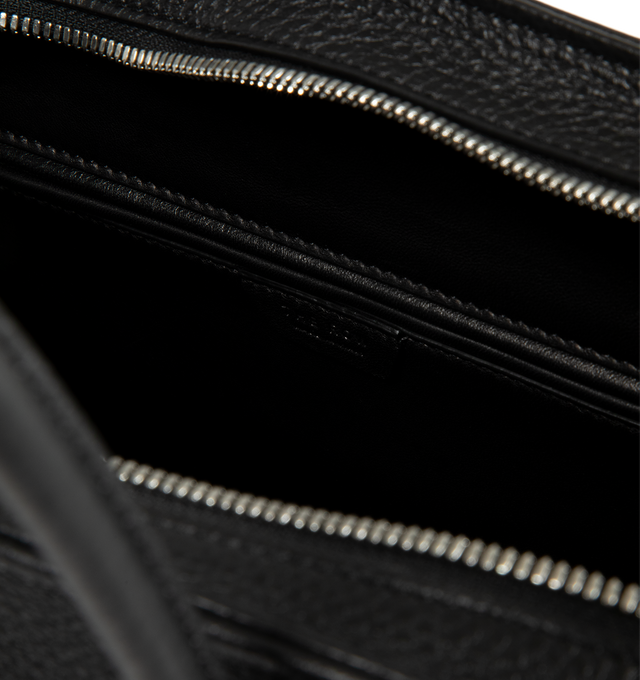 Image 4 of 4 - BLACK - The Row Agnes 15 Bag is crafted from finely grained calfskin leather and features a softly structured top-handle silhouette with tubular handles, gusseted side folds, a curved top zip closure, and a flat base. This designer leather handbag combines exceptional Italian craftsmanship with a spacious, minimalist design, while the naturally finished, metal-free tanned calfskin offers an exceptionally soft touch. Main Material: 100% Calfskin Leather. Lining: 100% Lambskin Leather. Dimensio