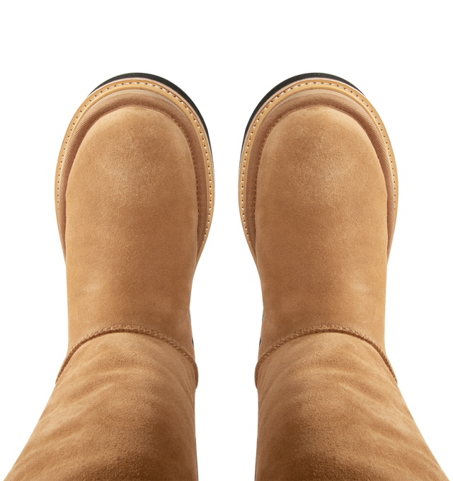 Image 3 of 3 - BROWN - UGG x sacai loafer designed for everyday wear, combines UGG's iconic premium  suede with sacai's unmistakable hybridized aesthetic. Upper is made with suede sourced from certified farms that practice regenerative agriculture upper. Midsole incorporates sugarcane EVA. Features Suede shaft, functional buckle, sugarcane EVA midsole, ibram XS Trek EvoVibram XS Trek Evo.