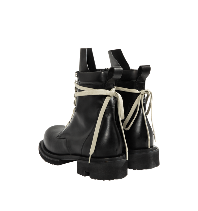 Image 3 of 4 - BLACK - RICK OWENS Low Army Gabe Boot featuring above-ankle height, front laces with eyelets on the foot and lacelets at the ankle, high geometric tongue, a stitched heel counter, long back pull tab, classic army sole and a low heel. 100% calf leather.