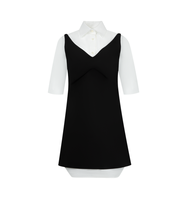 Image 1 of 2 - BLACK - BALENCIAGA Hybrid Shirt Dress in wool and silk blend featuring hybrid construction: mini dress layered over a short-sleeve shirt, front and back V-neckline, shirt collar, mother-of-pearl button front closure underneath, fitted waist, rounded shirt hem and invisible size zip. 80% wool, 20% silk. 100% cotton. Lining: 100% cupro. Made in Italy.