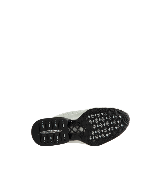 Image 4 of 5 - SILVER - Nike Women's Air Max Dolce features a laceless molded upper with an overlay cage and the signature Air Max silhouette. This streamlined design is detailed with visible Air cushioning in the heel for comfort and a distinctive profile. Designed as a versatile slip-on style. Upper: 70% Calf Leather, 15% Patent Calf Leather, 15% Fabric. Lining: 100% Fabric. Sole: 100% Rubber.