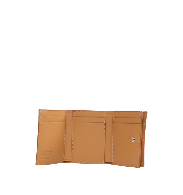Image 4 of 4 - BROWN - LOEWE Trifold Wallet featuring debossed LOEWE Anagram patch, snap button closure, six card slots and large pocket for notes, coin compartment and calfskin lining. Satin Calf. 3.1 x 4 x 1.5 inches. Made in Spain. 