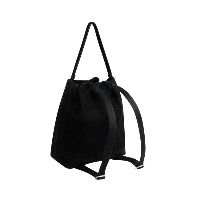 Image 2 of 3 - BLACK - THE ROW Backpack 9 in suede featuring a toggle fastening top, smooth leather trim, gold hardware, 2 adjustable, rivet fastening straps, 1 top handle, logo embossed purse feet at underside, single interior compartment with 1 slit pocket, key ring inside and suede lining. 10.5 W x 10.5 H. 100% calfskin leather. Made in Italy.