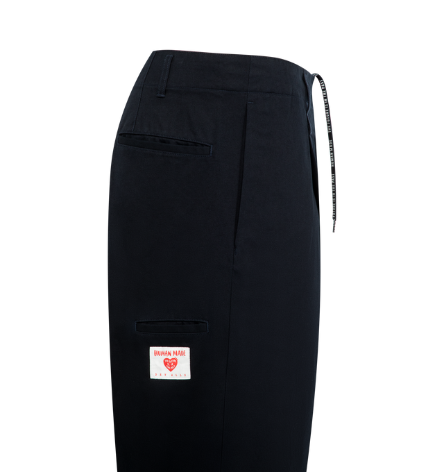 Image 3 of 3 - NAVY - HUMAN MADE Skater Pants featuring chino pants with a wide silhouette, left side pocket is sized to fit an iPhone and carabiner clip also included. 100% cotton.